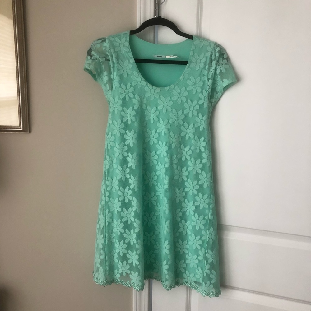 Light greenish/blue dress with flowers